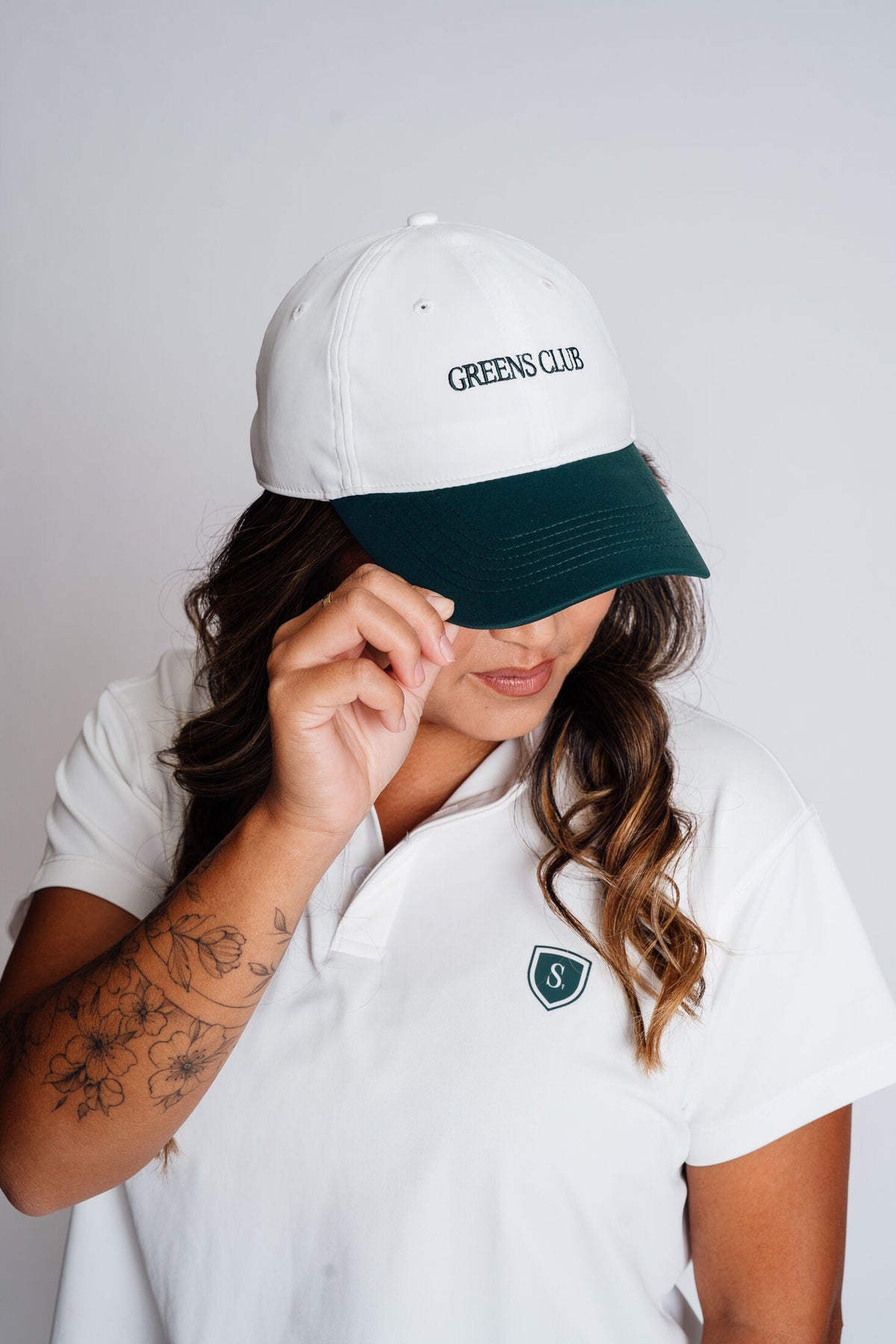 The Scord Greens Club Hat, a women's golf cap — detail view