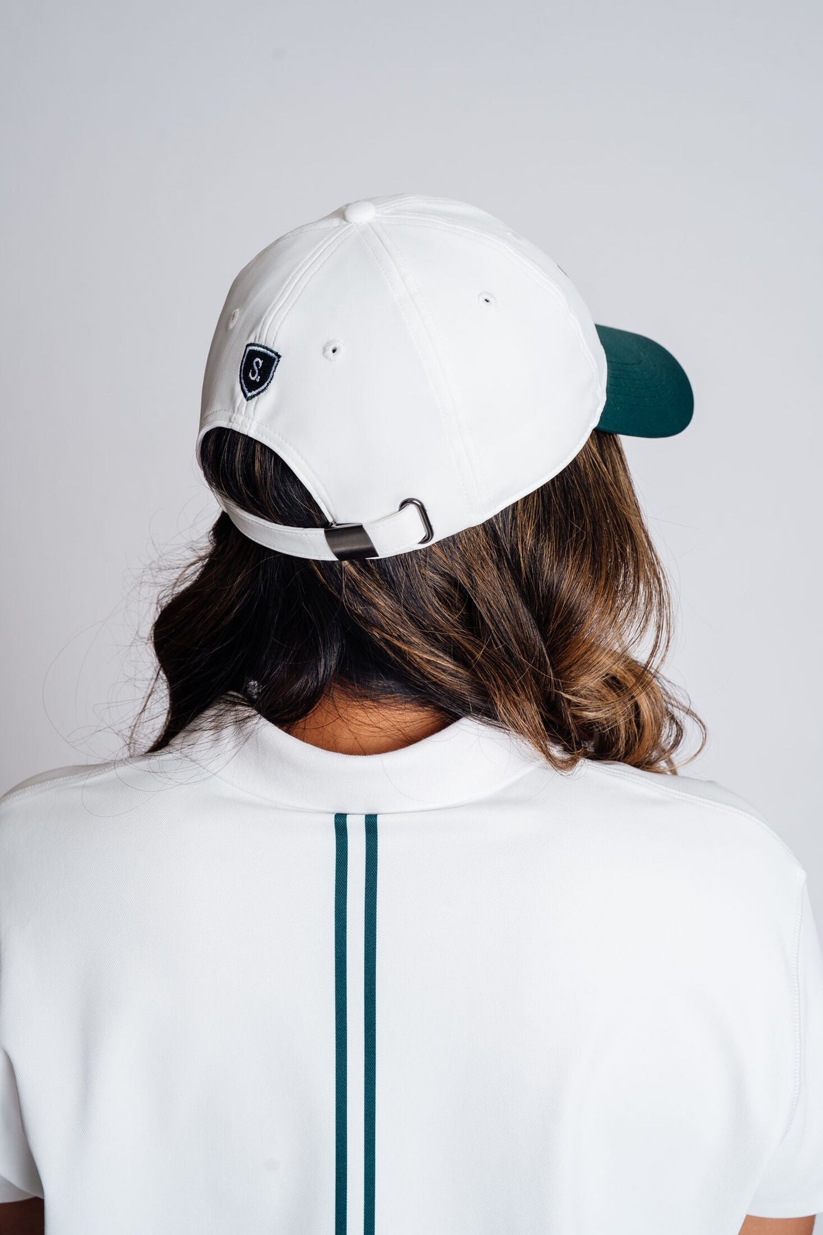 The Scord Greens Club Hat, a women's golf cap — detail view