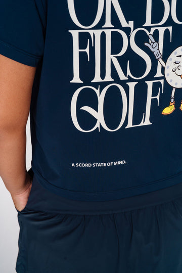 The Scord OK But First Golf graphic tee, a women's golf t-shirt — detail view